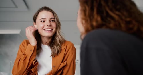Portrait of Young Couple or Friends a Girl Flirting with a Man Low Angle View