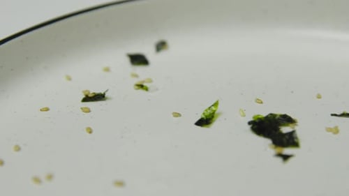 Close up pan shot of noble served salmon fillet with vegetables and topping in high class restaurant