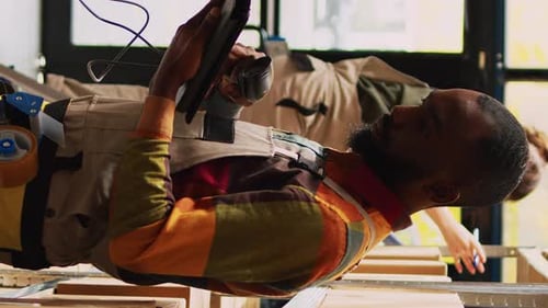 Vertical Video African American Man Scanning Barcodes