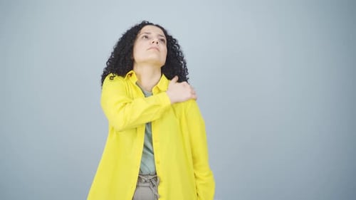 Young woman with shoulder pain.