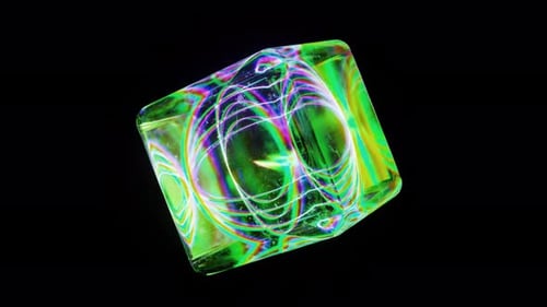 Green Transparent Neon Cube Rotates on a Black Background Laser Lines Inside the Cube Create Shapes