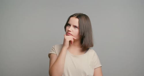 Woman Thinks, Has Eureka Moment and Raises Finger