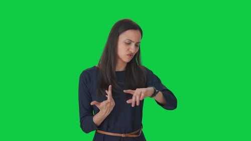 Angry Indian girl waiting for someone Green screen