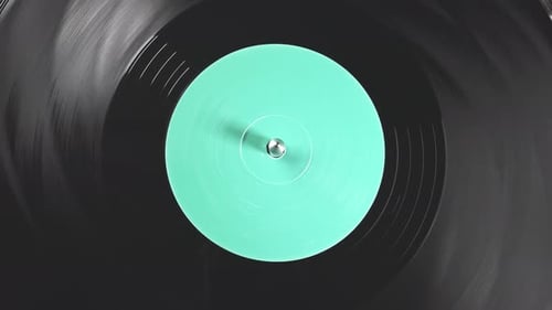 Vinyl Retro record on DJ turntable record player close up.