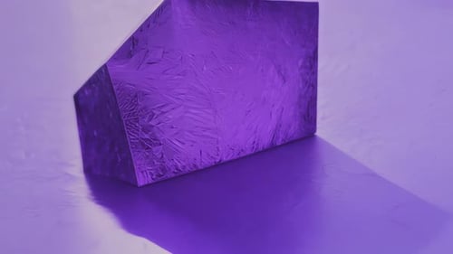 Abstract Purple Textured Block Rotating and Reflecting