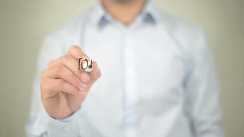 Writing "Top Performers" on a Transparent Screen