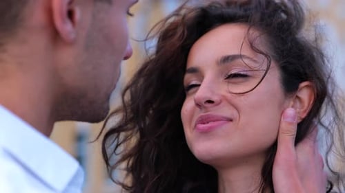 Close Up Shot of Happy Young Couple Gentle Man and Beautiful Woman Looking at Each Other in the Eyes