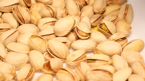 Ripe Pistachio Nuts Rotate in a Circle Healthy Food Nuts Veganism