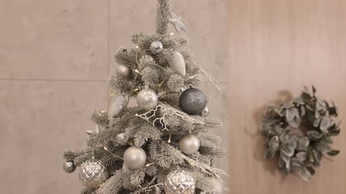 Decorated Christmas Tree with Silver Ornaments