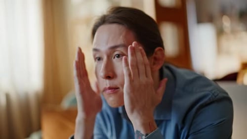 Exhausted Guy Rubbing Temples Sitting Sofa Cozy Living Room Closeup Tired Man
