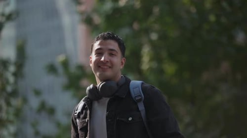 Latin Male Traveler Smiling Directly at Camera Close-up Portrait