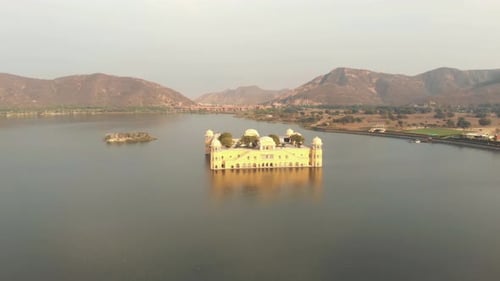 Serene Jal Mahal (Water Palace) laying in the middle of the Man Sagar Lake in Jaipur, Rajasthan, Ind