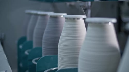 Winding Thread Spools on Machine in Factory