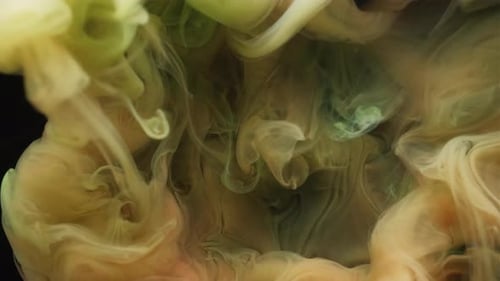 Swirling Yellow and Peach Pigments in Water