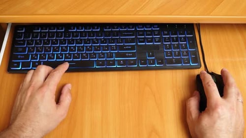 16Hands working on laptop with keyboard and mouse on wooden desk, concept of technology, internet, d