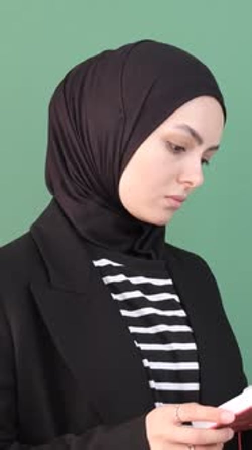 Muslim Girl Reading Novel