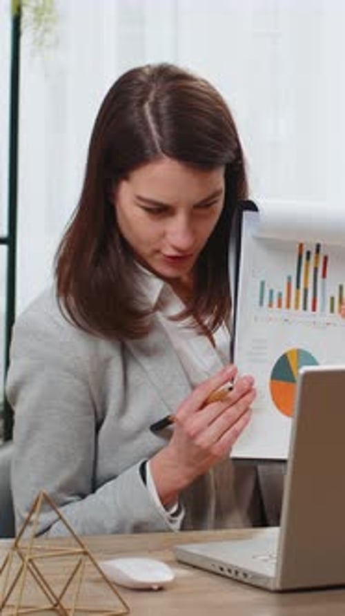 Business Woman Working on Laptop at Office Online Communication Video Call Graphical Analytics