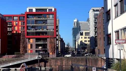 Balcony in luxury apartment near Main River in Frankfurt at sunny day. Skyline Downtown in backgroun