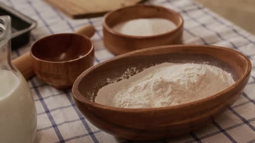Flour and Milk on Plaid Tablecloth for Baking