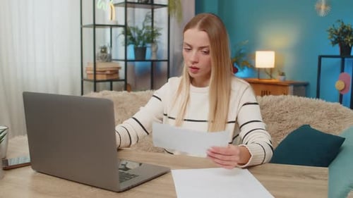 Woman Upset About Unpaid Bill at Home on Table Closing Laptop Feeling Bankrupt Blocked Payment