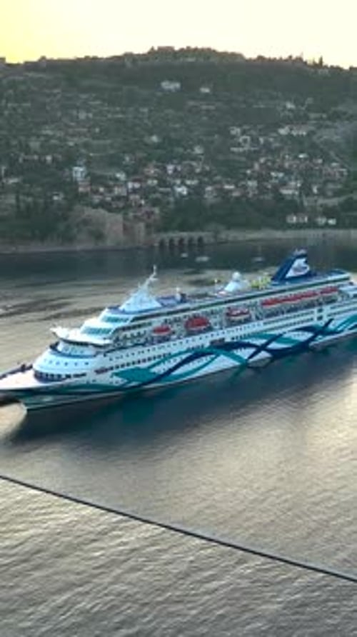Vertical Video Aerial Port Perspective Beholding the Massive Cruise Liner in Alanya