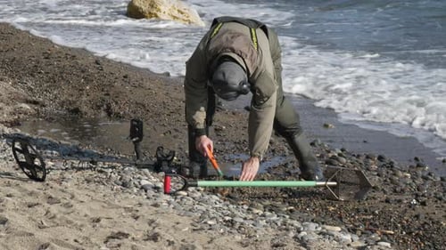 Detector Beach Treasure Man Searches Ocean Shore for Metal Objects Using Detector Now