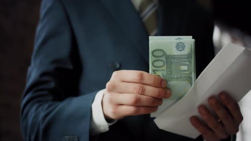 Bribery Money Exchange in Office