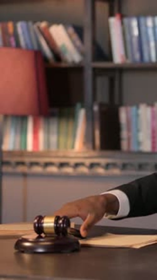 African Judge Striking Gavel to Announce Sentence, Vertical Video