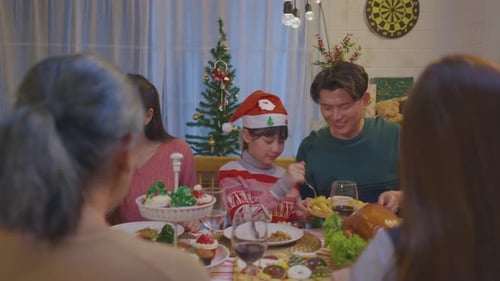 Family Gathering Celebrates Christmas at Home