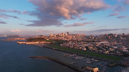 Wide angle drone shot of San Francisco, California during a beautiful sunset