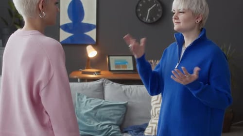 Young Adults Communicating Using Sign Language