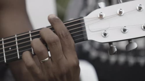Man Playing Guitar Closeup