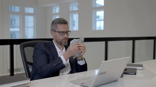 Easy Money Businessman Counting Dollars in Office Rich Man in Suit with Dollars Office Employer Man