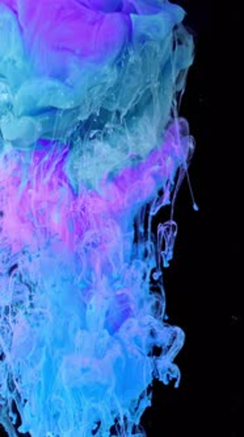 Vibrant Blue and Purple Ink Swirls on Black