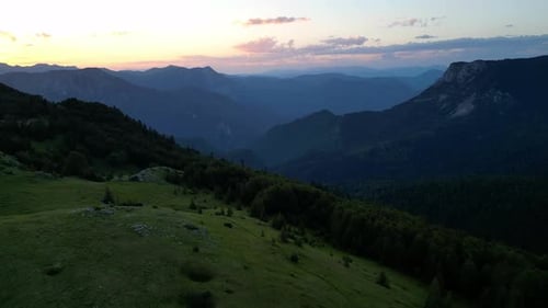 Aerial View of Forested Mountain Range During Golden Hour at Sunset Scenic Mountain Landscape