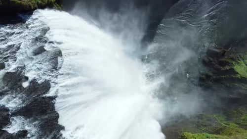 Skogafoss Waterfall in Iceland Summer Season in Mountain Beautiful Nature Landscape