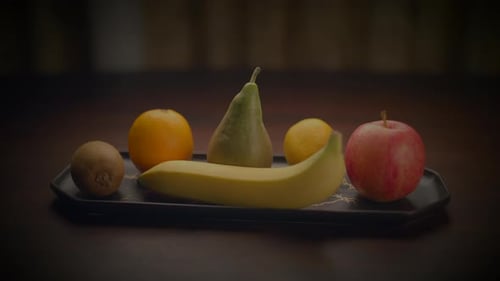 A Variety of Fresh Fruits Displayed on a Tray Showcasing a Healthy and Colorful Assortment The Scene
