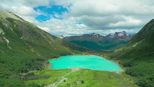 Aerial View on Azure Mountain Lake in Alpine Nature Landscape