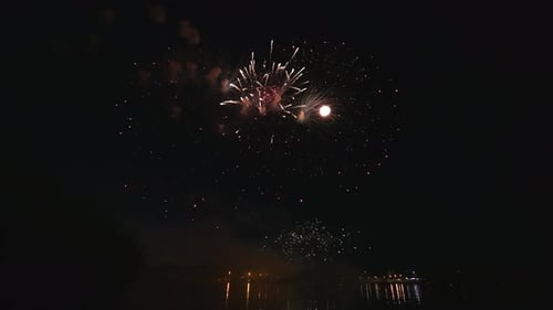 Awesome Real Firework on Deep Black Background Sky on Fireworks Festival From River Bank Over Night