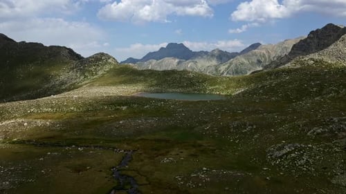 Aerial View mountain range with a lake in the middle