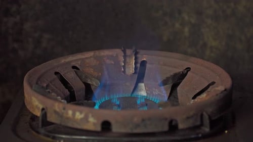 Lighting and Extinguishing Gas Burner Flame Close Up