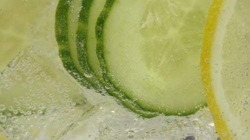 Invigorating Close-Up of Cucumber and Lemon Infused Drink