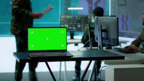 Military IT Specialist in Command Center Working on Collecting Field Data