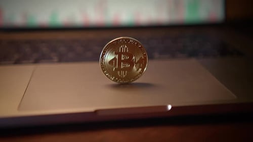 Bitcoin on a Laptop Trackpad