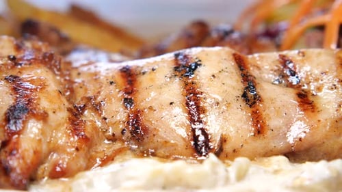 Close-up of Delicious Grilled Meat with Sauce