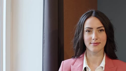 Portrait of young businesswoman in office