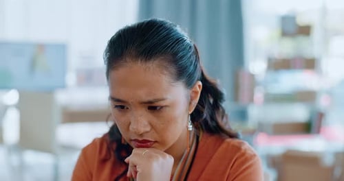 Serious, thinking and woman working in office for business strategy, planning and career decision