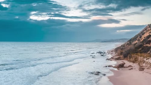 Aerial View of Beach and Ocean Waves