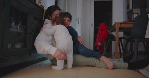 Loving Mother and Children Together at Home