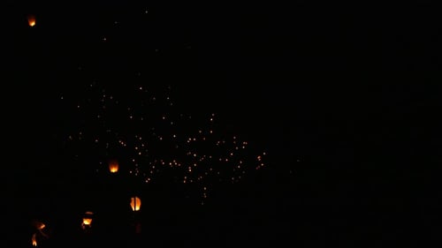 Floating Sky Lanterns Illuminate the Night